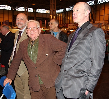 Chris Wiggins And Peter Bell Listening As Jed Sings The National Anthem